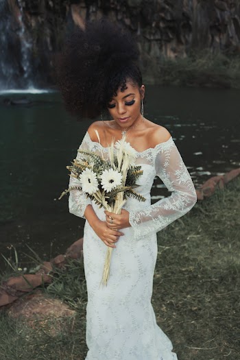 Photo Of Woman Holding Flowers
