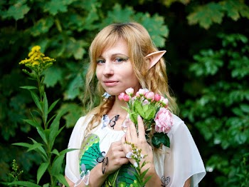 Photo Of Woman Holding Glowers
