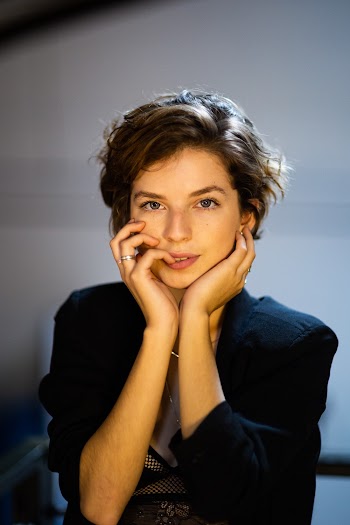 Photo Of Woman Holding Her Face