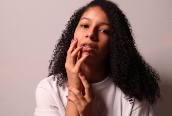 Photo Of Woman Holding Her Face