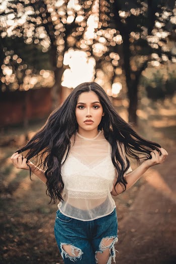 Photo Of Woman Holding Her Hair
