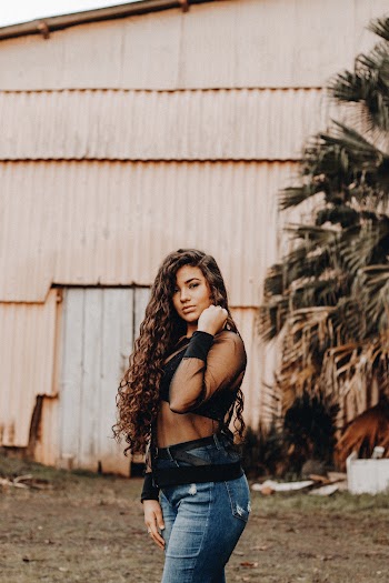 Photo Of Woman Holding Her Hair