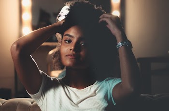 Photo of Woman Holding Her Hair
