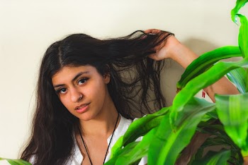 Photo of Woman Holding Her Hair