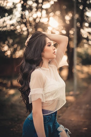 Photo Of Woman Holding Her Hair