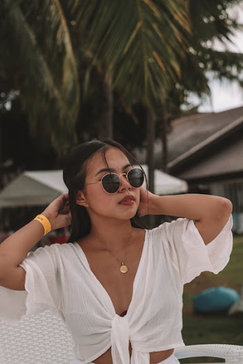 Photo of Woman Holding Her Hair