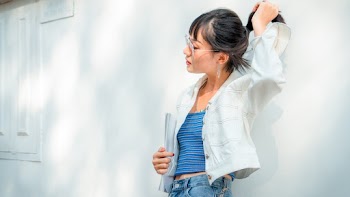 Photo Of Woman Holding Her Hair