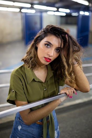 Photo of Woman Holding Her Hair