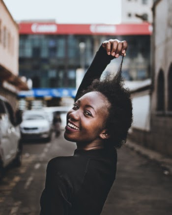 Photo of Woman Holding Her Hair