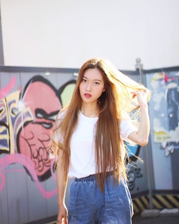 Photo Of Woman Holding Her Hair