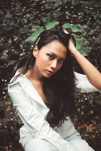 Photo of Woman Holding Her Hair
