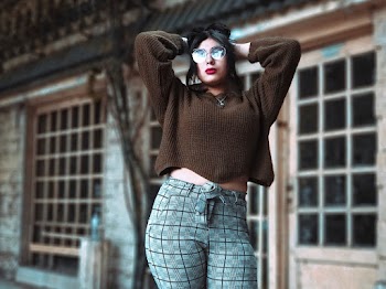 Photo of Woman Holding Her Head