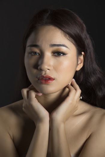 Photo of Woman Holding Her Neck