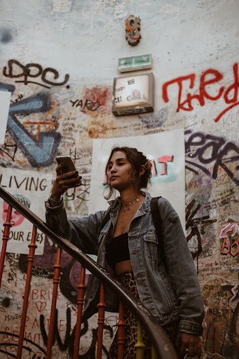 Photo Of Woman Holding Her Phone