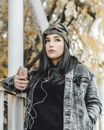 Photo Of Woman Holding Iphone