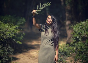 Photo Of Woman Holding Leaf