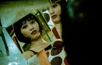 Photo Of Woman Holding Mirrror