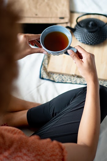 Photo Of Woman Holding Mug