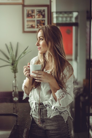 Photo Of Woman Holding Mug
