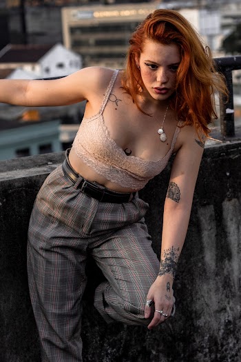 Photo Of Woman Holding On Handrail