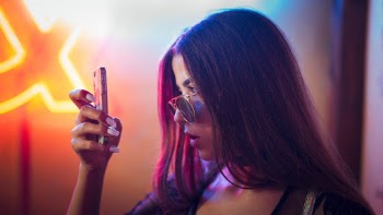 Photo Of Woman Holding Phone 