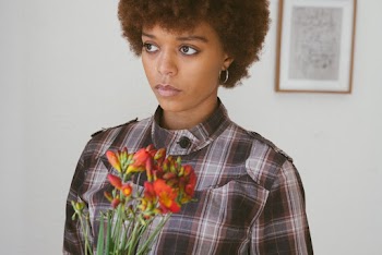 Photo Of Woman Holding Plant