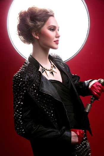 Photo of Woman Holding Sword