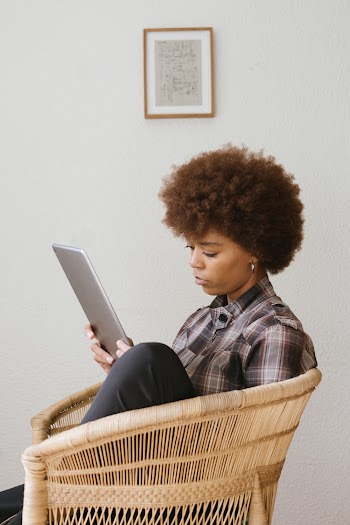 Photo Of Woman Holding Tablet