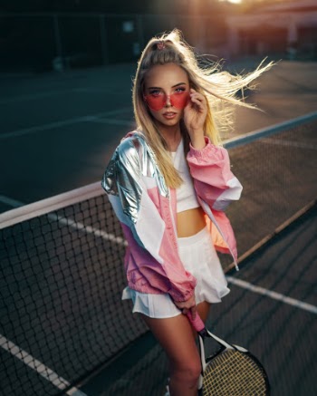 Photo Of Woman Holding Tennis Racquet