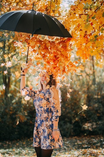 Photo of Woman Holding Umbrella