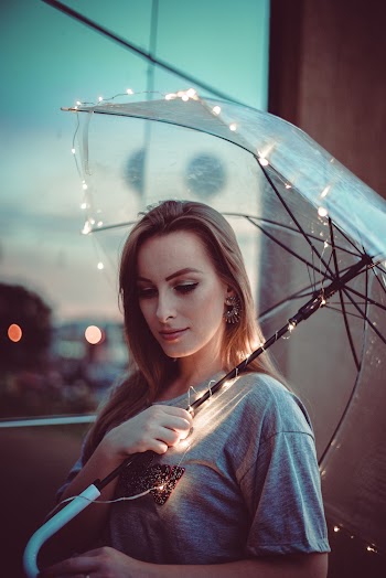 Photo Of Woman Holding Umbrella 