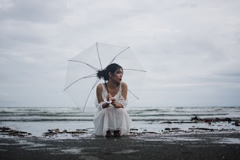 Photo Of Woman Holding Umbrella