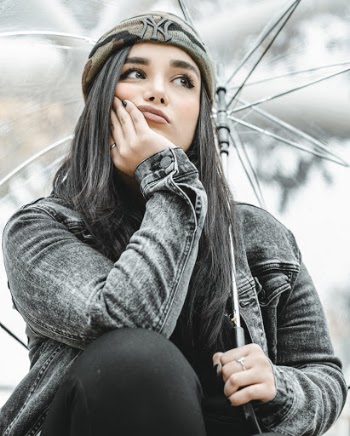 Photo Of Woman Holding Umbrella