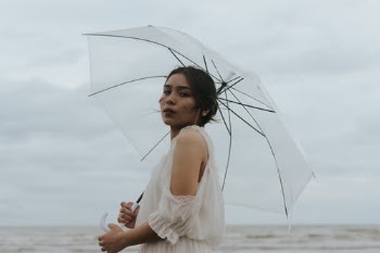 Photo Of Woman Holding Umbrella · Free Stock Photo