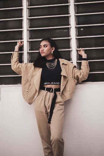 Photo Of Woman Holding Window Rails