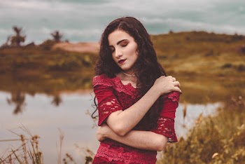 Photo Of Woman Hugging Herself