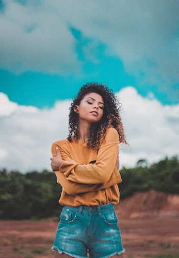 Photo Of Woman Hugging Herself
