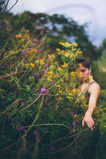Photo Of Woman In A Flower Field During Daytime