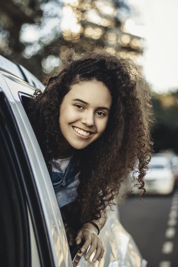 Photo Of Woman In A Vehicle
