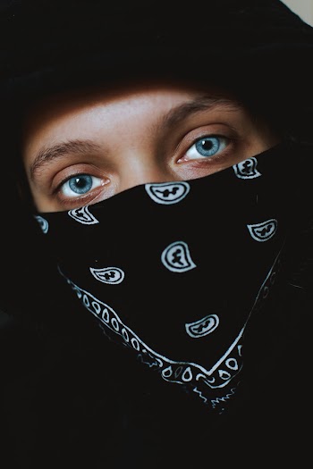 Photo Of Woman In Black Bandana