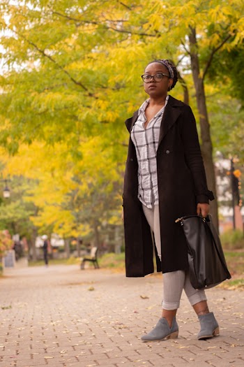 Photo of Woman in Black Coat 