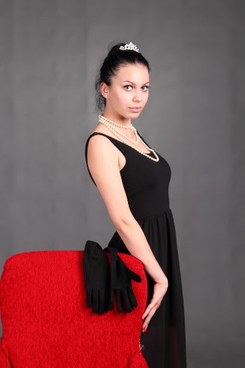 Photo of Woman In Black Dress