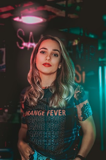 Photo of Woman In Black Shirt