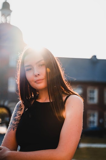 Photo of Woman in Black Tank Top