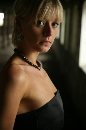 Photo of Woman in Black Tube Dress