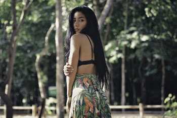 Photo of Woman in Floral Dress Posing