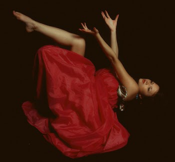 Photo of Woman in Red Dress