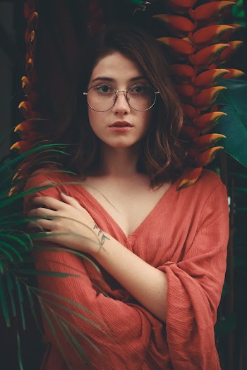 Photo of Woman in Red Long-sleeved Shirt