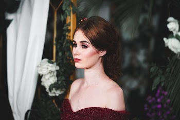 Photo of Woman in Red Off-shoulder Top