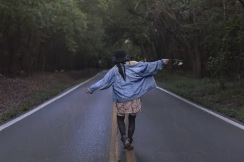 Photo of Woman In The Middle Of Road